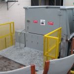 Enclosed Dock Installation, Rear Feed Hopper with a Swing Door, Hand-Fed