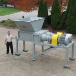 36 series electromechanical dual-shaft shear shredder with twin planetary drives.