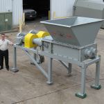 36 series electromechanical dual-shaft shear shredder with twin planetary drives.