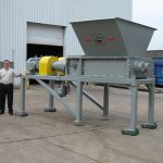 36 series electromechanical dual-shaft shear shredder with twin planetary drives.